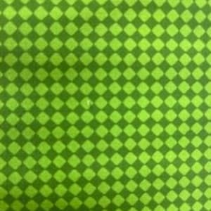 May include: A close-up of a green fabric with a repeating pattern of dark green diamond shapes. The pattern creates a checkered effect across the surface of the fabric. The fabric has a slightly textured appearance.