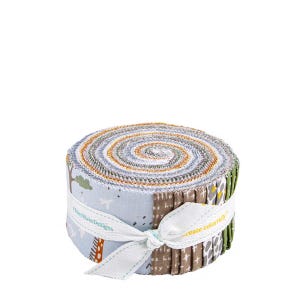May include: A rolled bundle of fabric strips in various colors, including blue, brown, green, and orange. The fabric is tied with a white ribbon that has text on it. The fabric is likely for quilting or other sewing projects.