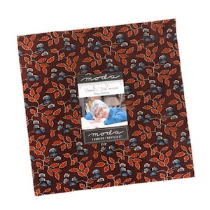 May include: A square fabric bundle featuring a repeating pattern of red leaves and blue flowers on a dark brown background. The fabric is from Moda Fabrics and Supplies, with a label showing a woman and the text "Pamela's Path 1850-1900 Betty Chutchin."