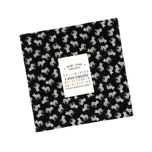 May include: A square stack of fabric featuring a black background with a repeating white tiger pattern. A white label is centered on top with the text Ruby Star Society, 1-800-CALICO, and Alexia Marcelle Abegg, accented by small colorful flowers.