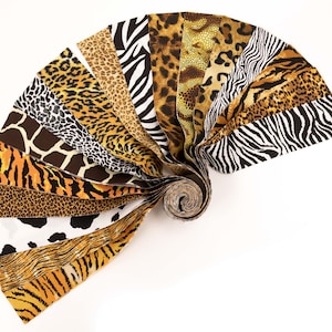 May include: A collection of fabric strips featuring various animal print patterns, including zebra, leopard, cheetah, tiger, and giraffe. The strips are rolled up in a fan shape, showcasing the different designs.