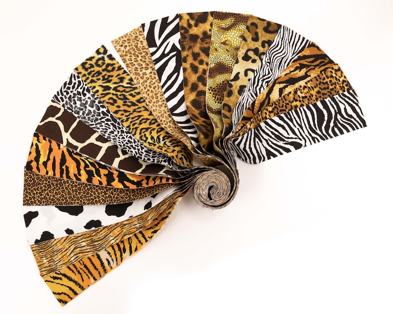 May include: A collection of fabric strips featuring various animal print patterns, including zebra, leopard, cheetah, tiger, and giraffe. The strips are rolled up in a fan shape, showcasing the different designs.