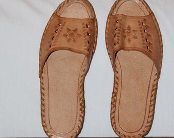 Vintage leather slippers, slides, stamped pierced leather hand laced light brown, likely nwot, indoor shoes 70s ethnic look