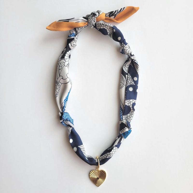 A bandana necklace available on Etsy, showcasing a classic pattern