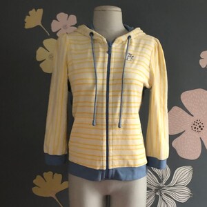 Yellow hoodie with white stripes 2025
