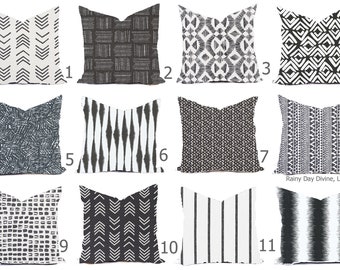 May include: Twelve different black and white patterned throw pillow covers. The patterns include geometric shapes, stripes, and arrows.