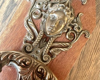 Antique coat hook with lady's portrait | brass on wood | brocante wall hook curiosity vintage decor