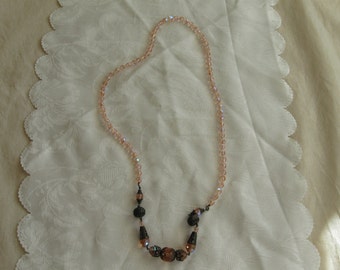 Long Pink Bead Necklace with Filagree Details