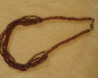 Multi Strand Amber Colored Bead Necklace,