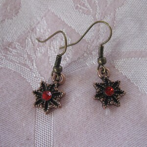 Small Antiqued Bronze Finished Dangle Earrings With Red Glass Center on French Wire