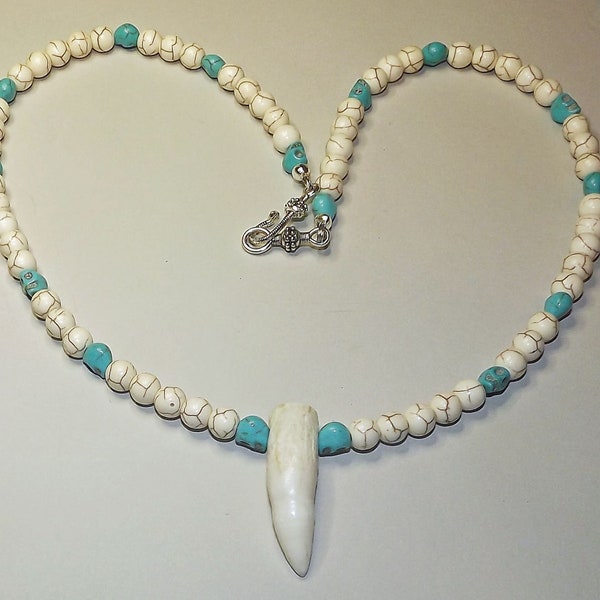 Florida Alligator tooth necklace, with white nature beads and turquoise skulls.