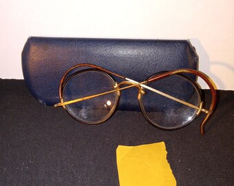 Lunettes de vue anciennes cerclées de corne avec timbre fiscal