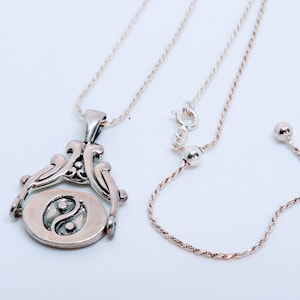 Sterling Silver Yin and Yang/Ohm/Om necklace