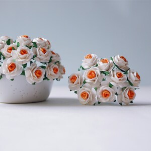 Paper Flower, 50 pcs. mini rose size 2 cm. 2 tone;white-orange color.