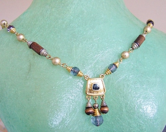 LIZ CLAIBORNE Inc. – LCi necklace faux wood and faux amethyst beads and pendant with dangles