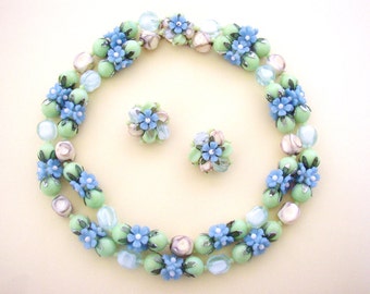 HONG KONG -  Set two strand necklace and clip on earrings plastic beads flowers enameled metal petals