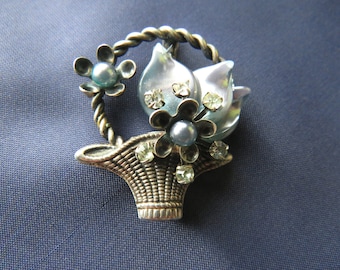 Small handmade brooch silver tone flower basket adorned with blue Louis Rousselet beads and clear rhinestones