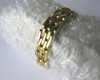 UNIDOR - Gold filled metal bracelet articulated tank design with box clasp and security latch hallmarked