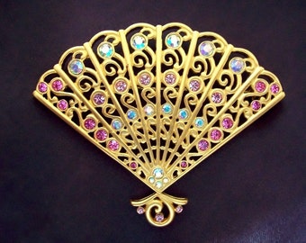 GIVENCHY - Fan brooch with oriental pattern gilded metal with pink and AB rhinestones