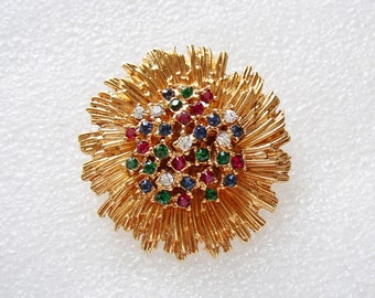 CARVEN – Flower brooch gilded metal with raised heart encrusted with multicolored rhinestones modernist style