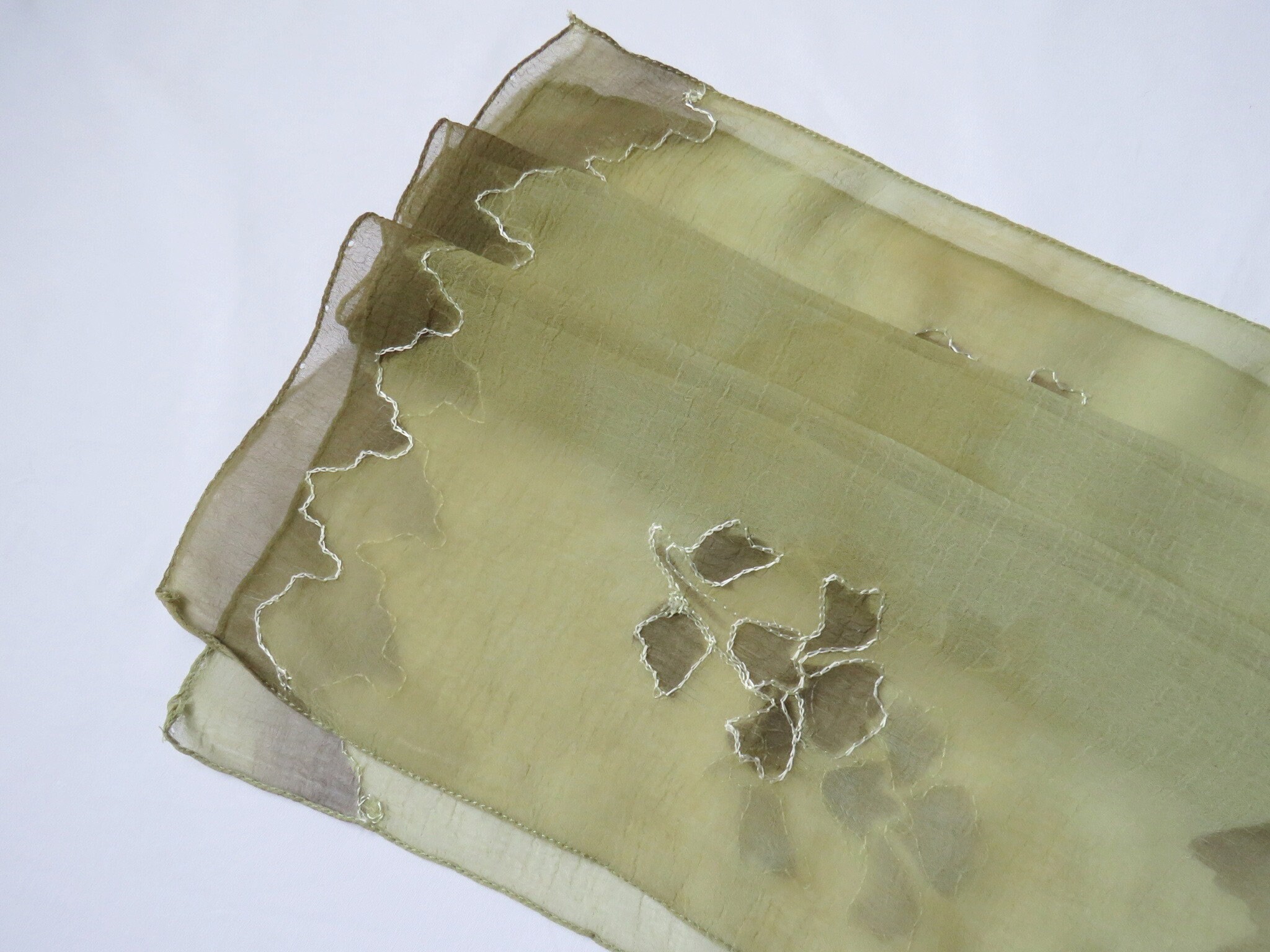Olive green semi transparent long scarf with dyed and embroidered flower pattern