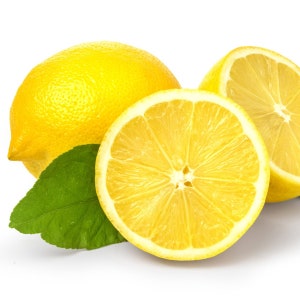 May include: Three lemons, one whole and two halves, with a green leaf. The lemons are yellow and the leaf is green.