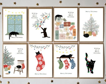 May include: A set of eight white greeting cards featuring black cat illustrations and Christmas themes. Designs include cats with holiday lights, stockings, presents, and trees, with the text Wishing you a Merry Christmas and Merry Christmas.