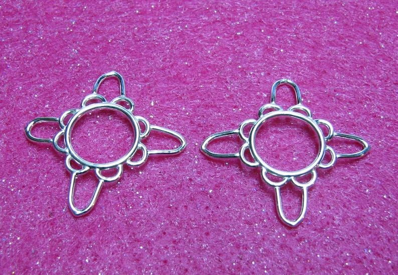 Pair of Four Point Star Nipple Shield \u2013 A handmade pair of non-pierced nipple rings.