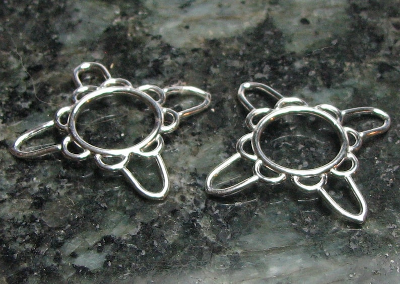 Pair of Four Point Star Nipple Shield \u2013 A handmade pair of non-pierced nipple rings.