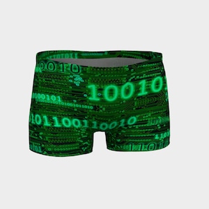 May include: Green and black athletic shorts with a digital pattern of binary code and the number "10010" in green.