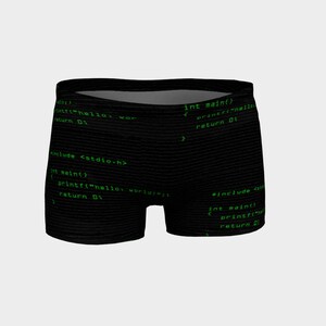 May include: Black and green underwear with a graphic print of computer code. The code includes the text "int main()", "printf("hello world!")", and "return 0;"