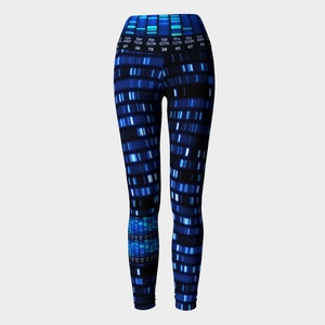 May include: Blue leggings with a DNA sequence pattern. The leggings have a high waist and a tight fit. The pattern includes the amino acid abbreviations and the codons for each amino acid.