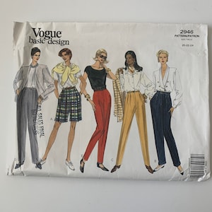 May include: A vintage Vogue basic design sewing pattern. The pattern features illustrations of five different women's outfits, including pantsuits, shorts, and blouses. The pattern number is 2946, and the size is 20-22-24. The text "ALL SALES FINAL NO RETURNS" is visible.