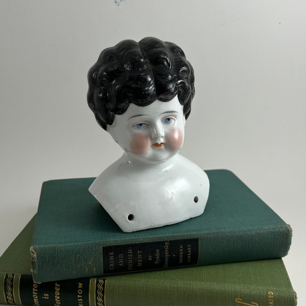 Antique Porcelain China doll head and shoulders, 5 inches tall, low brow blue eyes,  not marked, estimate 1900 -1910