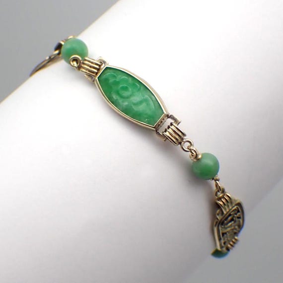 翡翠の輝きを放つゴールドブレスレット セーフティー ピン ブレスレット ゴールド | VERSACE JP