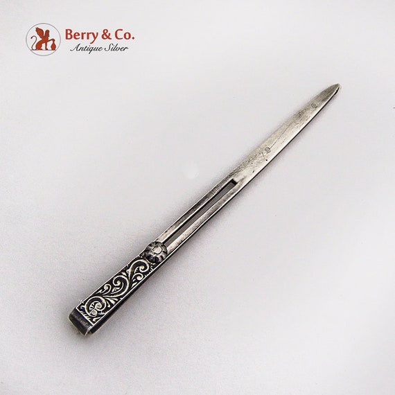 Antique Sewing Tool Sterling Silver Chased Scroll Design 1900