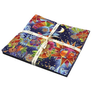 May include: A stack of colorful fabric squares with a celestial theme. The fabric features a blue background with stars, a sun with a face, a moon, and flowers. The fabric is tied together with a cream-colored ribbon.