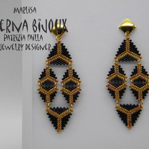 May include: A pair of long, black and gold geometric earrings. The earrings are made of small beads and have a triangular shape. The earrings are hanging from gold hooks.