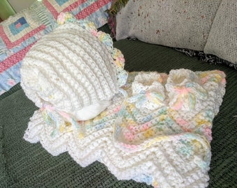 Baby afghan blue and cream trim crocheted by me 35x37shell stitch