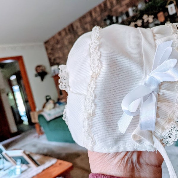 Baby bonnet,  cotton with lace trim..white.. 14.00