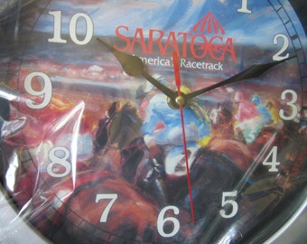 Quartz Clock from Saratoga Racetrack..America's racetrack  form 11 1/2" W X 1 1/2" thick..#2 horse never opened in original box AA battery