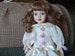Ceramic bisque doll 12'  long curly synthetic hair glass eyes eye lashes 