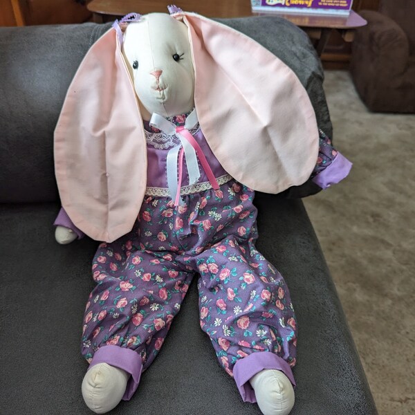 Easter Bunny hand made..all cotton...18" tall.all hand sewn including floral junp suit..button eyes, embroidered face .entirely stuffed