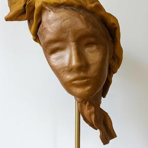 Handmade Leather Woman Face Sculpture: Bronze Finish Artisan Mask