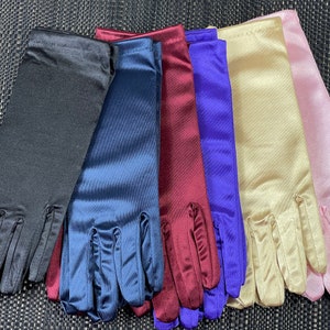 May include: Six pairs of long satin gloves in different colors: black, navy blue, burgundy, purple, beige, and pink.