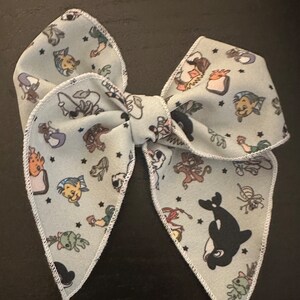 Towarzysz magicznej postaci, duża kokarda żeglarska na klipsie!