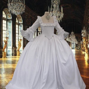 Beautiful white or Ivory Claire.  Ideal 18th century wedding gown.  Fully corseted