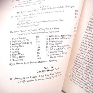 May include: Open book with text about Tai Chi. The left page lists posture names like 'Wu Chi Position' and 'Beginning T'ai Chi'. The right page has related text. The book is open to a section titled 'The Before Heaven Form'.