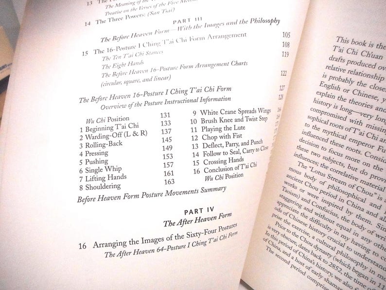 May include: Open book with text about Tai Chi. The left page lists posture names like 'Wu Chi Position' and 'Beginning T'ai Chi'. The right page has related text. The book is open to a section titled 'The Before Heaven Form'.