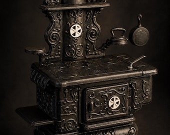 May include: A detailed miniature black cast iron stove with ornate scrollwork and white accents. The stove features a chimney, a small kettle, and a frying pan. The stove is a vintage style, perfect for dollhouses or miniature collections.
